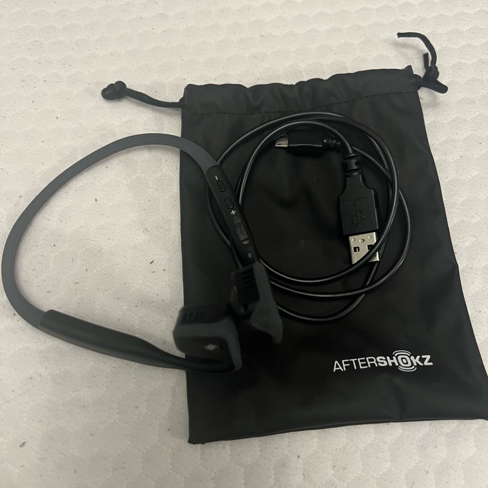 Used once Aftershokx head phones black